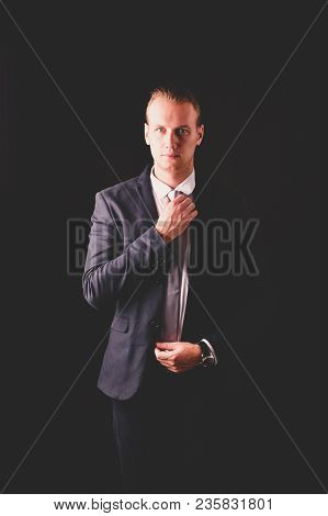 Concept Business People. Businessman On The Background. Businessmen Look Dastardly. Businessmen Show