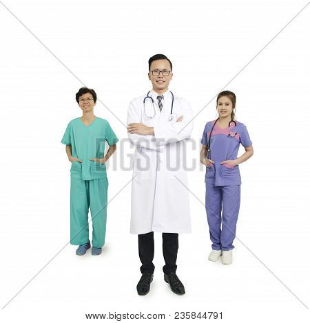 A Group Of Doctors And Nurses Standing In The Hospital, Indoors