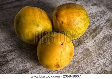 Closeup Of Rare Araza Fruits On Rustic Background