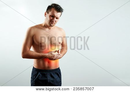 Front View, The Man Holds Hands For His Side In The Liver's Rena, Liver Pain Highlighted In Red, Liv