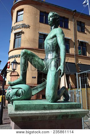 Helsingborg, Sweden - 11 April, 2018: Bronze statue of David made in 1922 by Ivar Johnsson on Stortorget square in the city center