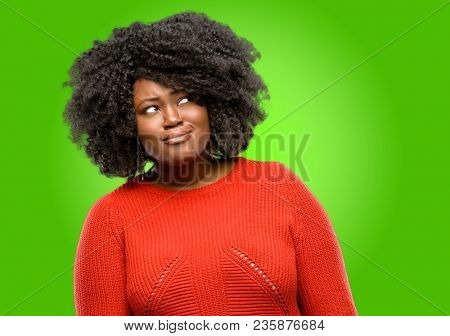 Beautiful african woman making funny face fooling