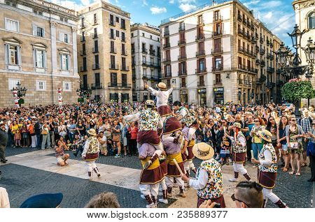 Barcelona, Spain - May 29, 2016: The Castellers De Barcelona Of The Corpus Christi Festival Stand In