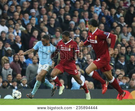 MANCHESTER, ENGLAND - APRIL 10: Raheem Sterling  runs with the ball during the Champions League quarter final match between Manchester City and Liverpool at the Etihad Stadium on April 10, 2018 