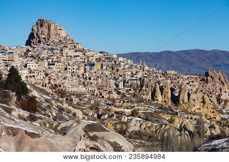 Uchisar In Cappadokia In Winter At Sunny Day With Blue Sky