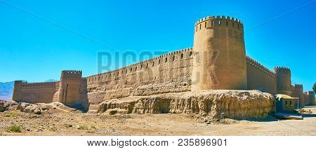 The Corner View Of Rayen Citadel With Massive Circle Tower And Tall Adobe Ramparts, Built On The Roc