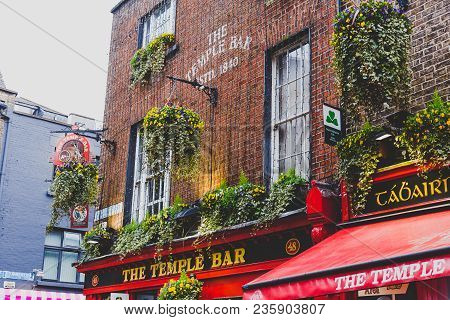 Dublin, Ireland - April 12th, 2018: The Temple Bar Pub In Dublin, Arguably The Most Popular Traditio