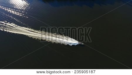 Aerial View Of A Boat On Summer Lake