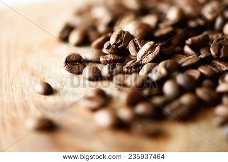 Coffee Beans On Light Wooden Background With Copyspace For Text. Coffee Background, Food Frame, Text