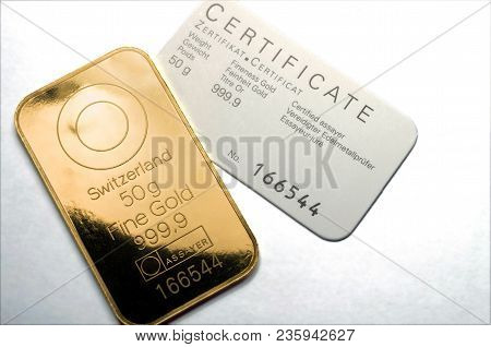 Minted Gold Bar Weighing 50 Grams With Certificate. Gold Ingot With Assay Certificate.