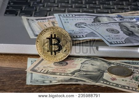 Golden Bitcoin On A Dollar Bills, Concept,сrypto Currency