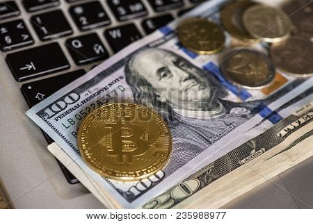 Golden Bitcoin On A Dollar Bill, Concept