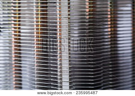 Aluminum Radiator With Copper Heat Pipe Close-up With Beautiful Bokeh Metallic Background