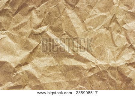 Texture Of Coarse Crumpled Brown Paper, Used For Food Packaging.  Background
