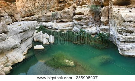 Emerald Green Waters Of Wadi Shab In Oman