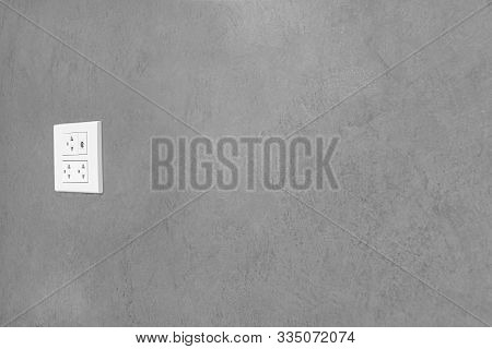 Electrical Outlet On Wall Loft Style,
Power Plug On White Concrete Wall, Energy Socket.