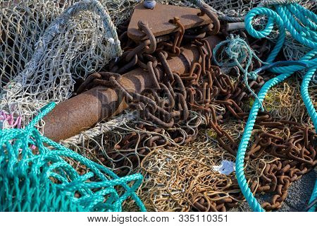 Nets, Rusty Chains And Ropes, Equipment On A Fishing Boat, Selected Focus
