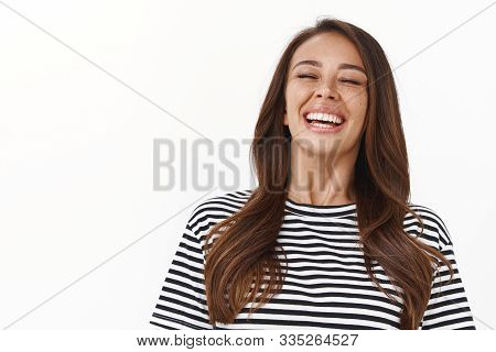 Close-up Carefree Enthusiastic Gorgeous Tanned Woman With Freckles In Striped T-shirt Laughing, Clos