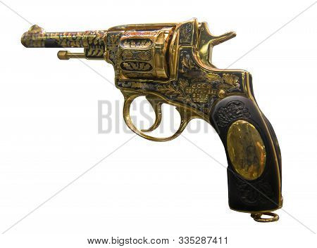 Golden Revolver Of The Nagan System, Made In 1928. Isolated On White