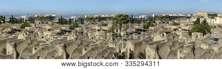 Panoramic View Of Herculaneum Ancient Roman Ruins. This Ia An Unesco World Heritage Site. At The Bac
