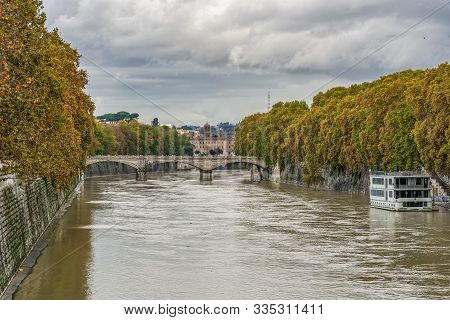 Rome, Italy - November 20 2019: Tiber River High Tide Water Rise. Day View Of High Water Level Flood