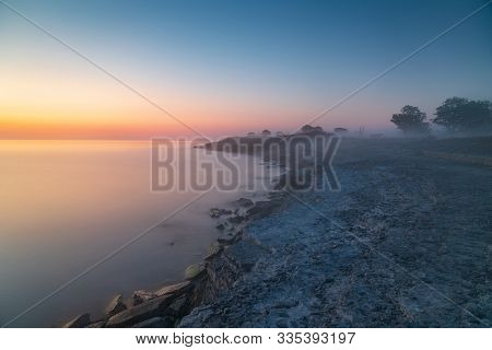 Stone Wall On The Baltic Sea In The Summer. Osmussaar Coast, Island In Estonia, Europe.