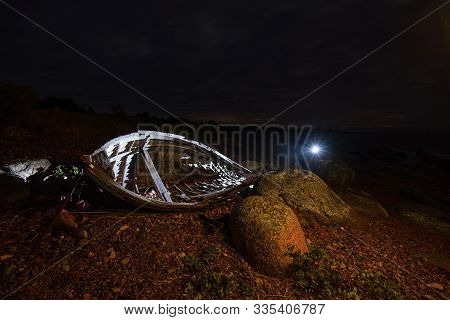 Old Boat, Shore, Evening Light, Sunset, Clouds And Architecture Concept In The Baltic Sea. Mohni, Sm