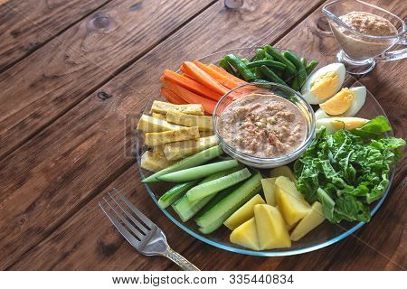 Dish From Indonesia. Gado-gado Salad On A Wooden Background.