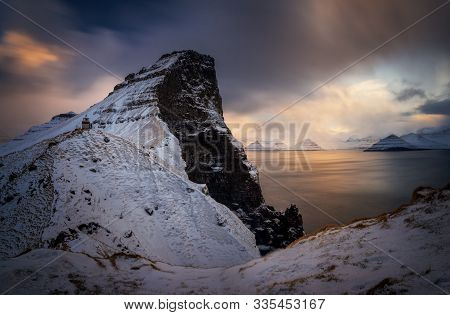 Kallur Lighthouse On Kalsoy Island In Cloudy Day, Faroe Islands