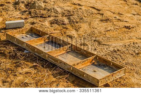 Closeup Of Concrete Form On Ground Of Construction Site.