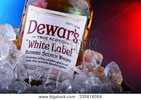 Bottle Of Dewars Blended Scotch Whisky In Bucket With Ice