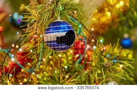 Detail Of Christmas Tree With A Broken Blue Glass Ball