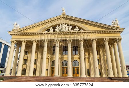 Minsk, Belarus - November 24, 2019: Kastrycnickaja plosca or October square with soviet Palace of culture of labor unions building, central square in Minsk