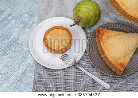 Delicious Home Bake Poached Pear Tart Pie, As Known As Tarte Bourdaloue, A Cup Of Coffee Latte. It I