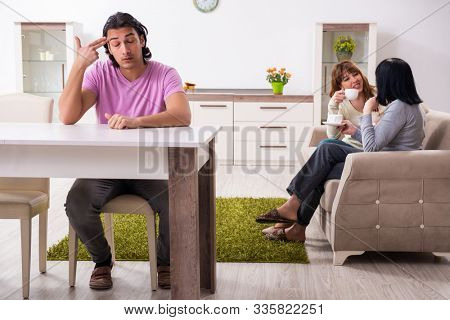 Young family and mother-in-law in family issues concept