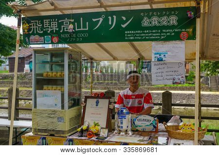 Takayama, Japan - October 3, 2019: Scene Of The Miyagawa Morning Market, With Shop And Seller, In Ta