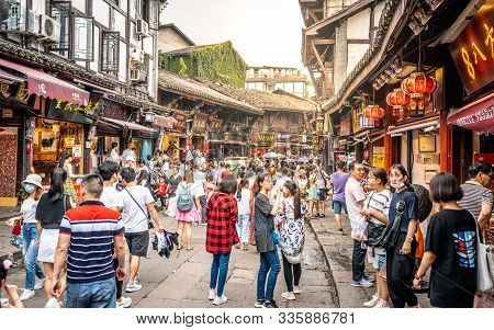 Chongqing China, 7 August 2019 : Ciqikou Alley Full Of People With Old Houses And Shops In Chongqing