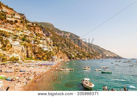 Positano, Italy - September 05, 2019: Amazing Positano Cityscape On Rocky Landscape, People On The B
