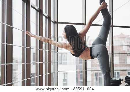 Stretching Gymnast Woman Doing Vertical Split, Twine