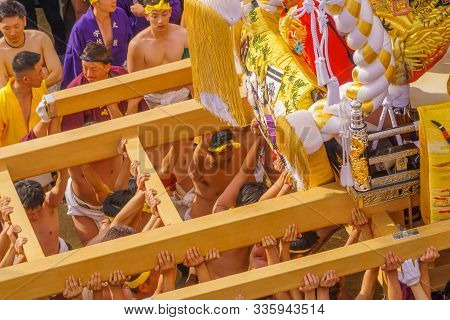 Himeji, Japan - October 14, 2019: Portable Shrine Lifted By Men In Traditional Dressing, And Crowd. 