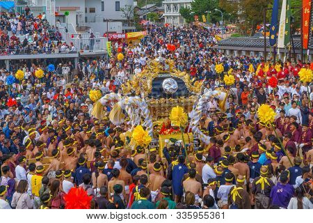 Himeji, Japan - October 15, 2019: Portable Shrine Carried By Men In Traditional Dressing, And Crowd.