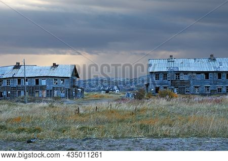Abandoned Wooden Houses In The Village Of Teriberka On The Kola Peninsula In Northern Russia
