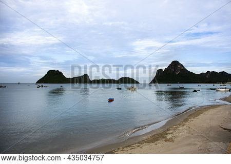 View Landscape Seascape And Wooden Fishing Boat Floating In Sea Waiting Catch Fish And Marine Life W