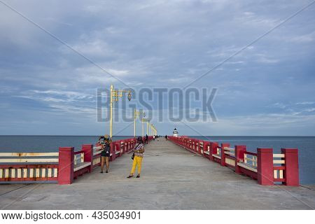 Thai People And Foreign Travelers Travel Visit Rest Relax And Exercise Playing Sport On Saphan Saran