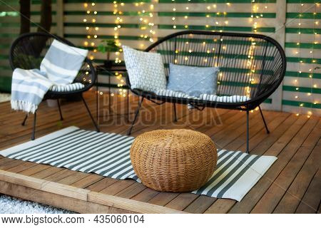 Modern Lounge Outdoors In Backyard. Terrace House With Wooden Floor, Comfortable Sofa, Armchair And 