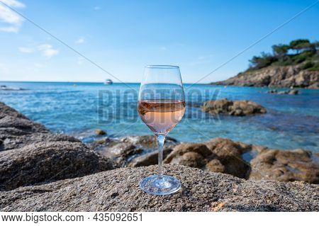Summer Time In Provence, Glass Of Cold Rose Wine On Sandy Beach And Blue Sea Near Saint-tropez, Var