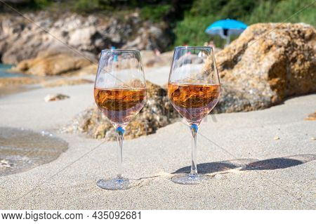 Summer Time In Provence, Two Glasses Of Cold Rose Wine On Sandy Beach Near Saint-tropez, Var Departm