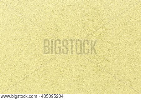 Sample Of A Texture Of Yellow Plaster. Wall Finished With A Decorative Cement Stucco. Example Of Ext