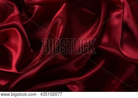 Elegant Bright Satin With Waves. Fabric Backdrop, View From Above. Luxury Cloth Texture. Prefect As 