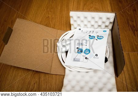 Paris, France - Aug 11, 2021: Unboxed Package Of New Wifi Dongle For Home-connect Refrigerators Manu